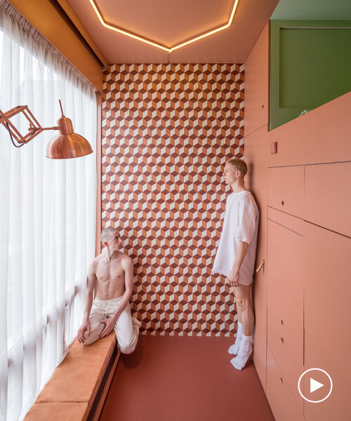 this tiny apartment in rotterdam is fitted with two infrared saunas and a whirlpool bath