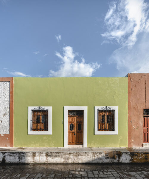 casa verde stands out in bright green facade after renovation by richaud arquitectura