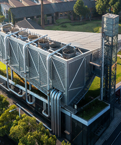 xing design's sculptural energy center sits in park in china like a mechanical cloud