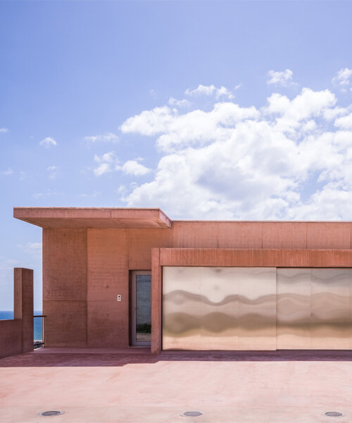 pedro cardigo captures alvaro siza's casa colien, a stepped concrete volume in hilly barcelona