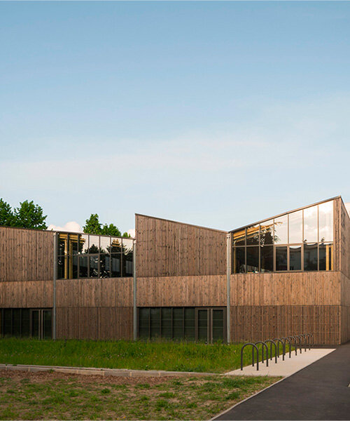 wooden facade wraps social facility by DREAM in villejuif fostering connection to nature