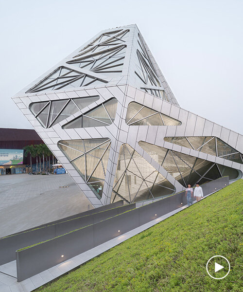 faceted glass curtain walls flood DJI's shenzhen origami-like flagship store with sunlight