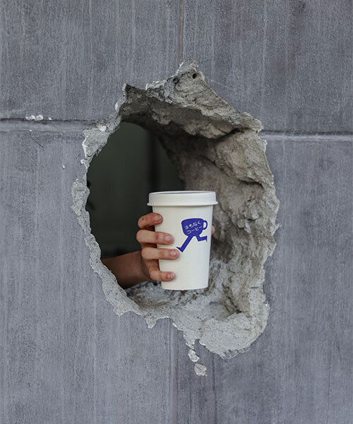 filipino café serves beverages straight through a hole in a concrete wall