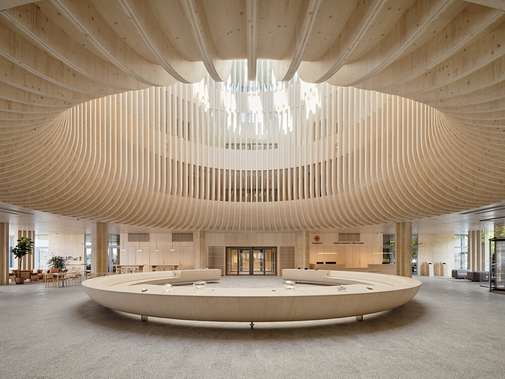 katajanokan laituri landmark in helsinki greets visitors with a cascading wooden skylight