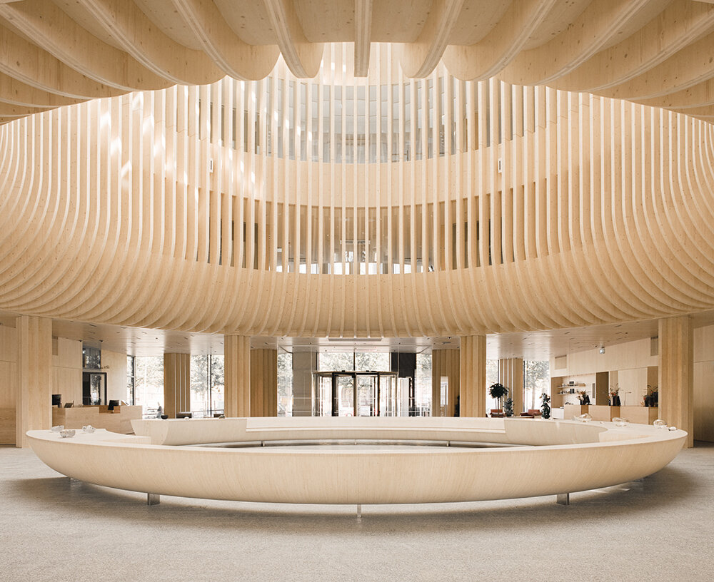 katajanokan laituri landmark in helsinki greets visitors with a cascading wooden skylight