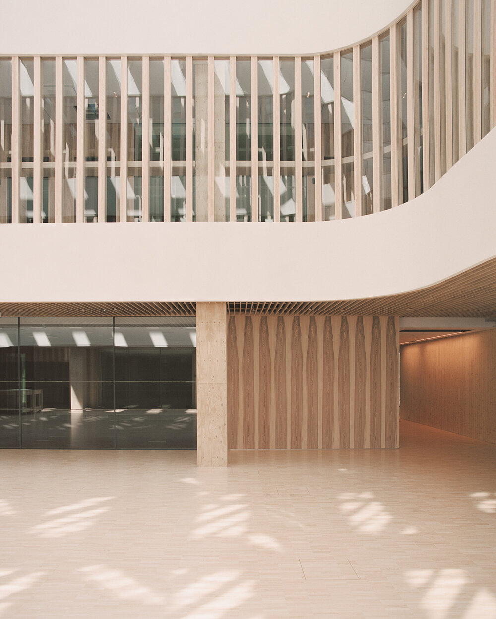 katajanokan laituri landmark in helsinki greets visitors with a cascading wooden skylight