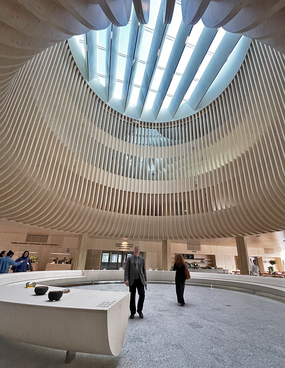 katajanokan laituri landmark in helsinki greets visitors with a cascading wooden skylight