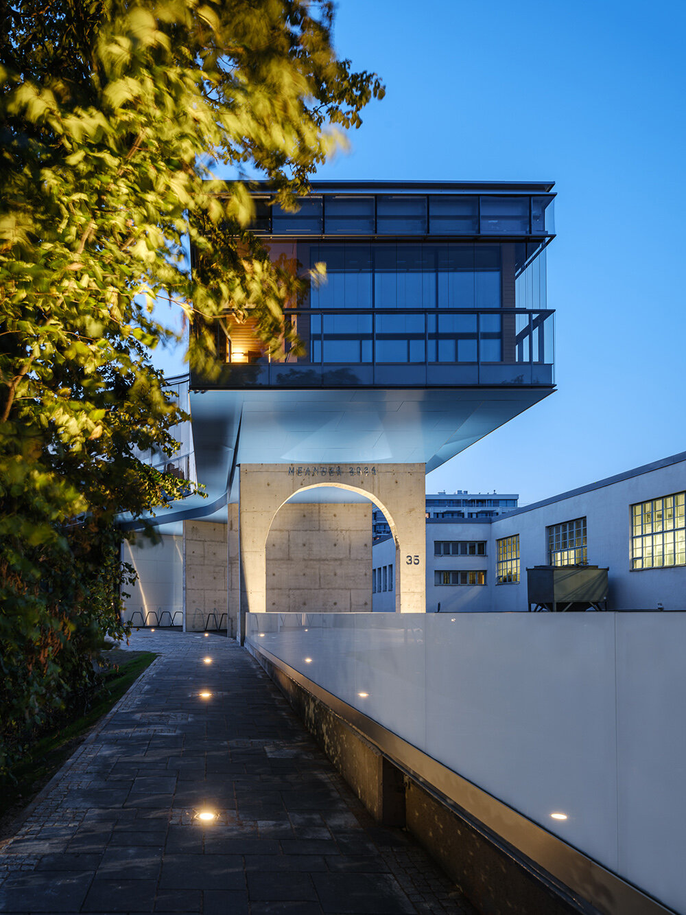 glass-wrapped meander house by steven holl marks grand opening at helsinki design week