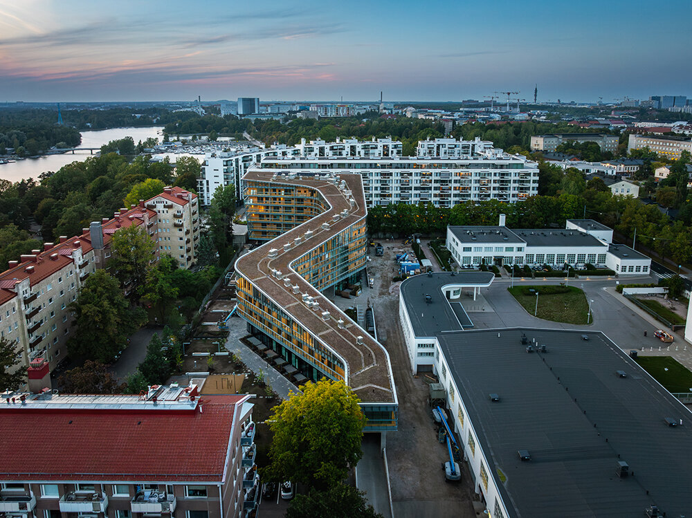 glass-wrapped meander house by steven holl marks grand opening at helsinki design week