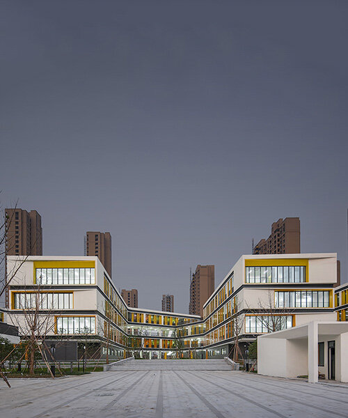 open, colorful facade by GLA design brings life to staggered school buildings in hangzhou