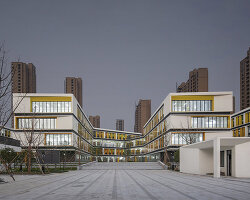 open, colorful facade by GLA design brings life to staggered school buildings in hangzhou