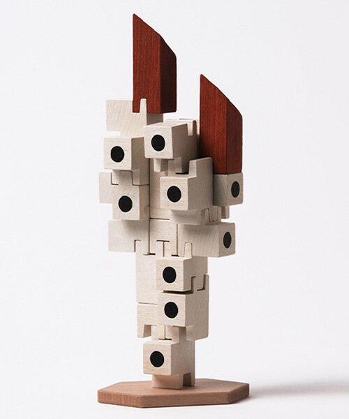 oscar diaz pays tribute to iconic nakagin capsule tower with playful wooden block set