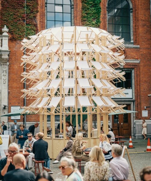 kinetic pavilion of wooden deck chairs by lasovsky johansson blooms in copenhagen