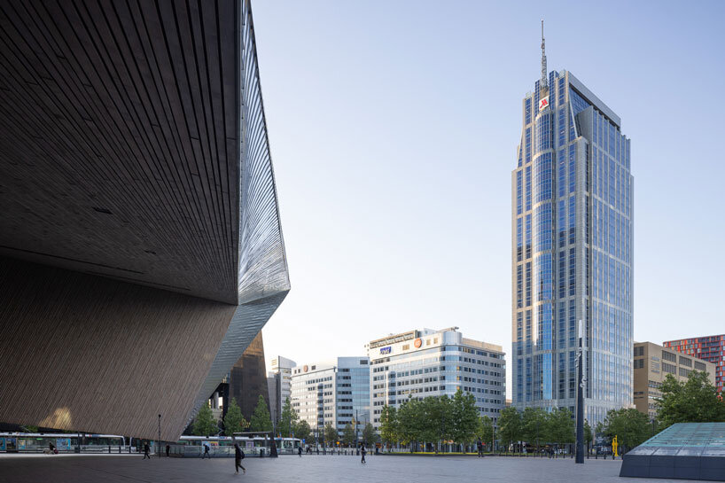 andrew campion captures transformative qualities of light within rotterdam central station