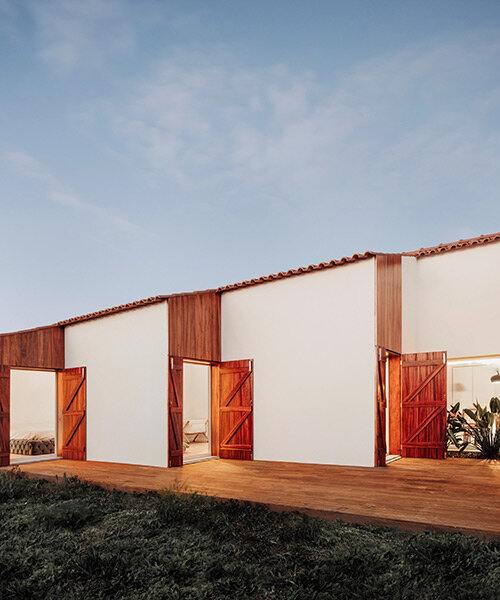 fábio ferreira neves draws from mediterranean architecture to design this 'casa no meco'