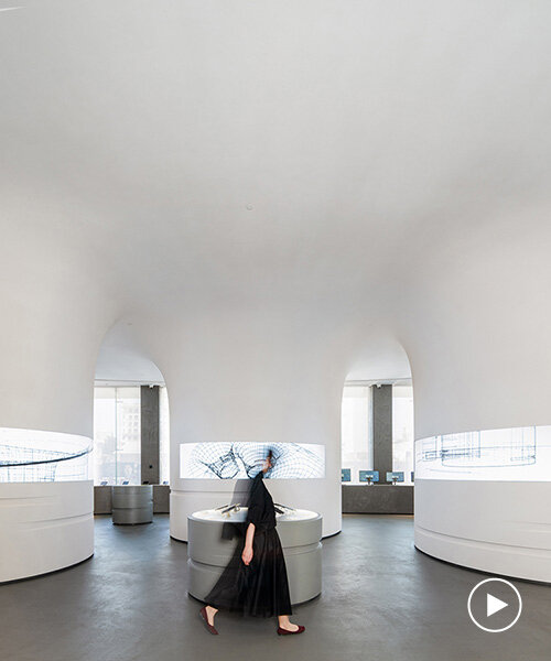 spiral pathways define cylindrical forms in digikala tehran flagship store's fluid interior