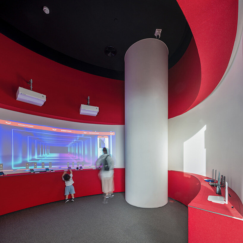 spiral pathways define cylindrical forms in digikala tehran flagship store's fluid interior