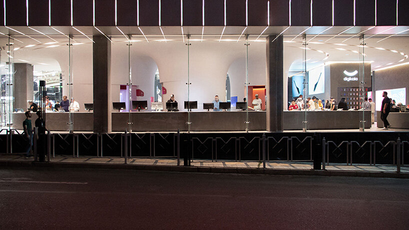 spiral pathways define cylindrical forms in digikala tehran flagship store's fluid interior