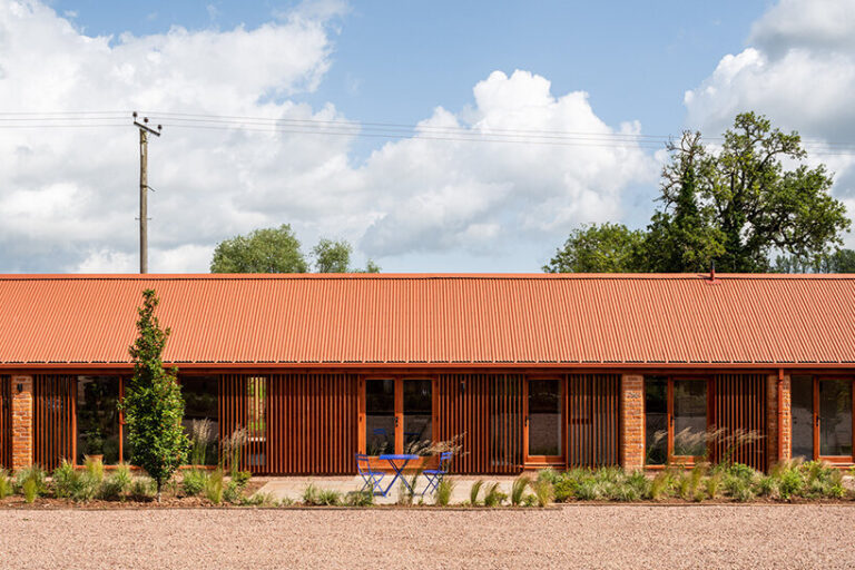 stolon studio transforms english dairy farm into 'the parks' housing