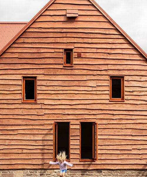 stolon studio renovates english dairy farm into eight sustainable homes, 'the parks'