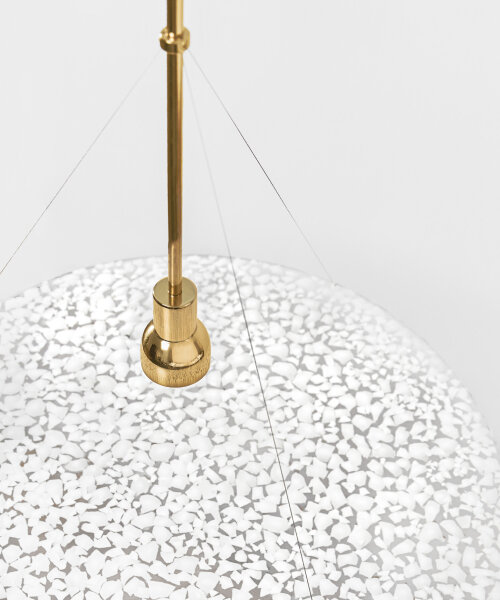 studio yellowdot bonds recycled eggshells and resin for ‘hatch’ pendant light at maison&objet