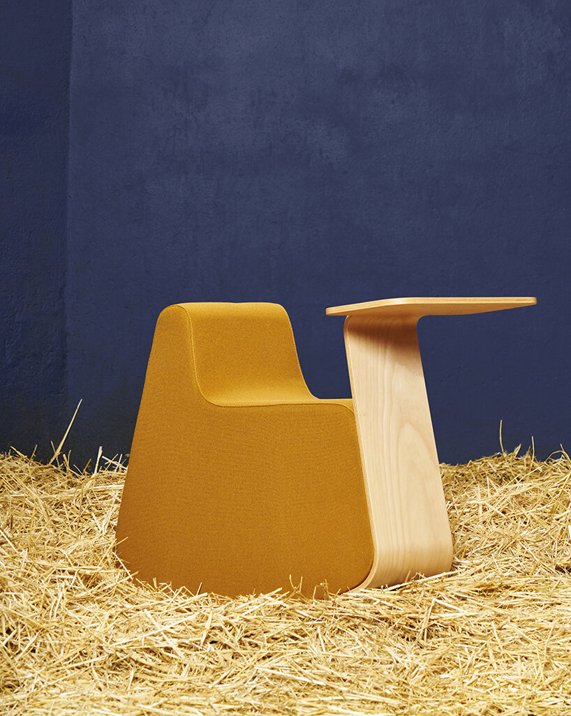 rocking pouffe-table hybrid by dsignio redefines workspaces with a nostalgic twist