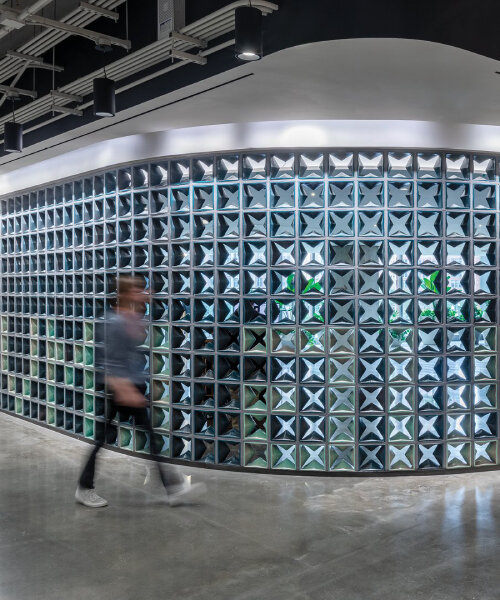 brian peters' 3D printed ceramic blocks wrap around screen wall at amazon hq2 in virginia