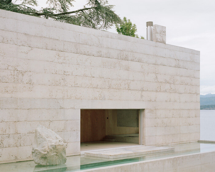 villa montasser's reflections dance on water creating symmetrical geometric compositions