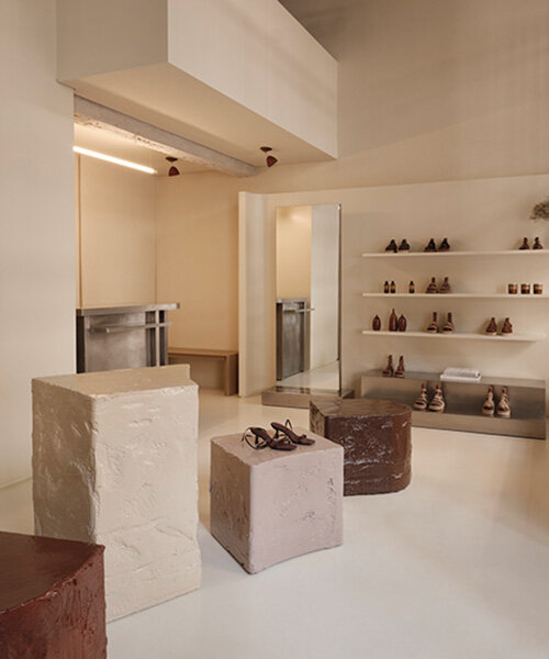 warm earthy hues saturate nancy katri’s esiot athens store, echoing artisanal craftsmanship