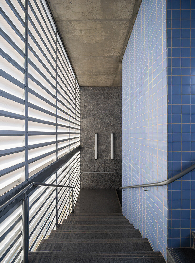 aluminum second skin facade shields alumnus school from brazilian sunlight