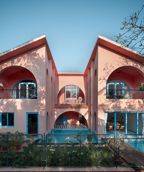 six u-shaped villas in north goa shape up bold pink arches around pool courtyards