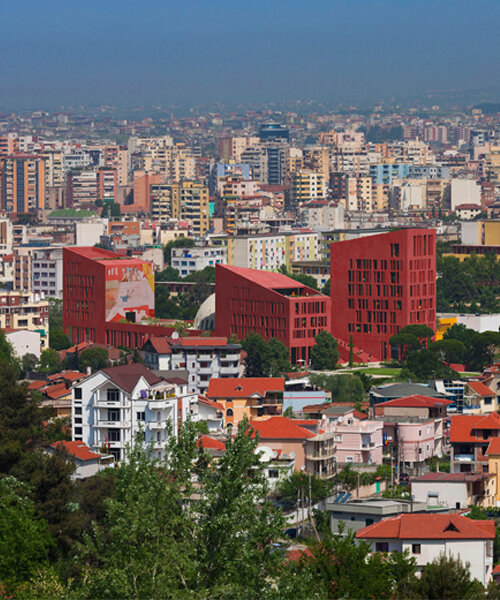 oppenheim architecture reveals tirana’s college of europe campus as red concrete cluster