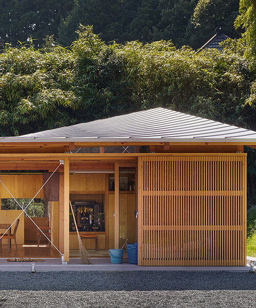 curved roof follows ridgeline of japanese mountains in weekend home by ota archistudio