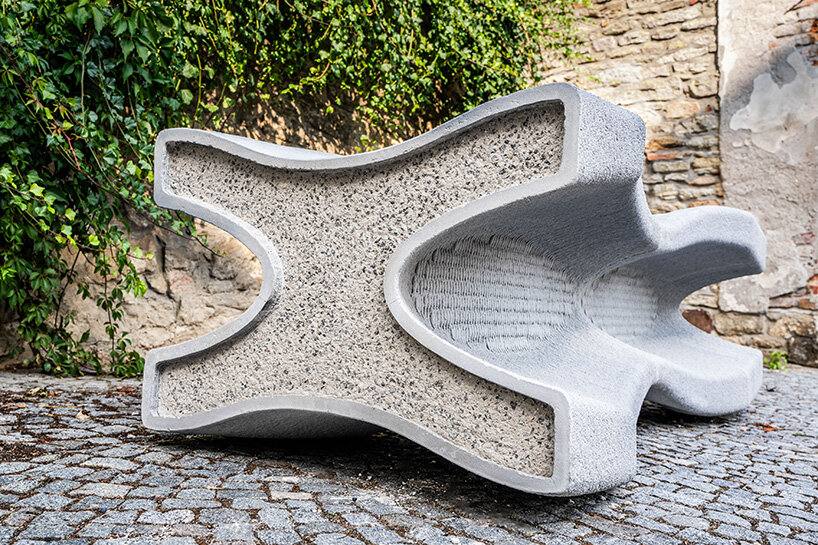 concrete bench X doubles as a planter, reflecting czech republic's gothic heritage