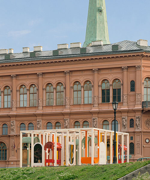 colorful arches, hammocks and mirrors shape up modular installation in riga's dome square