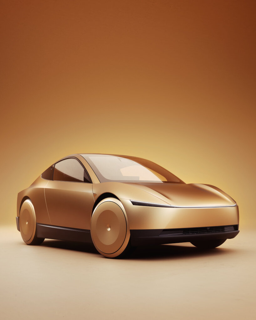 The exterior of the Tesla Robotaxi appears uniform with a metallic, gold-like color