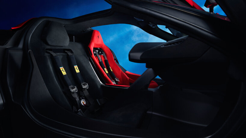 the passenger seat is integrated into the supercar’s interior in a way that it almost disappears from view