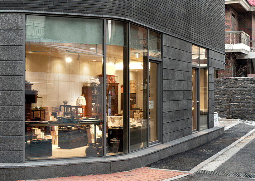 gray brickwork envelops curved 'S gallery' residence near seoul forest