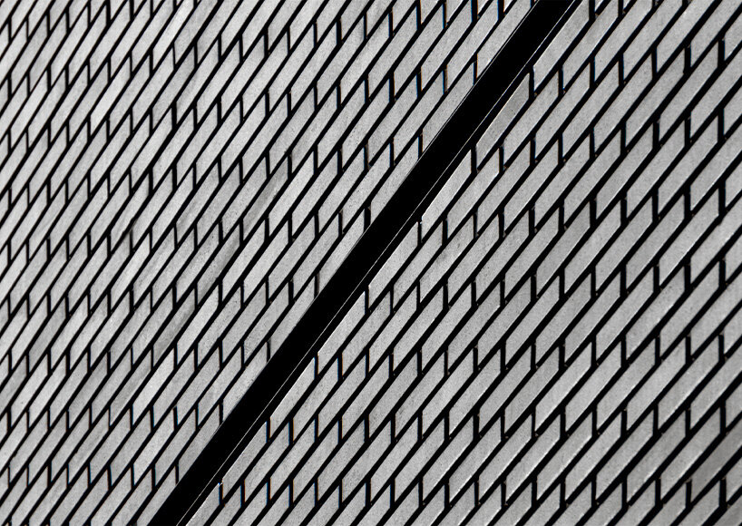 gray brickwork envelops curved 'S gallery' residence near seoul forest