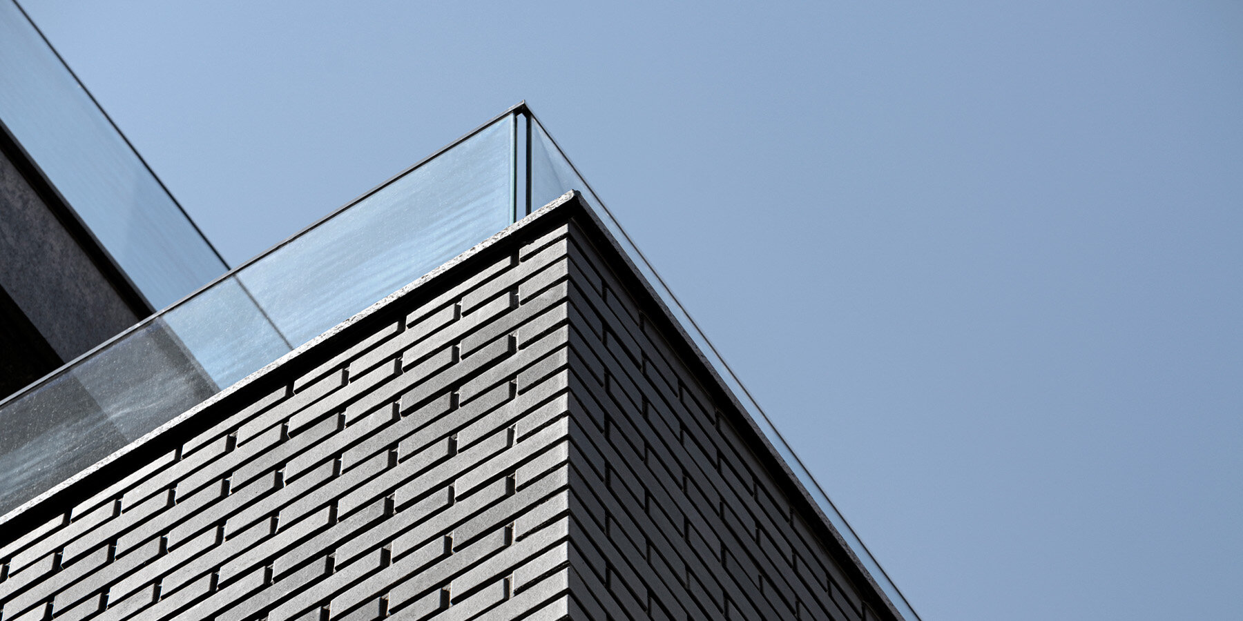grey-bricks-curved-corner-cubic-geometry-gallery-s-residence-seoul-lksd-designboom-1800-03