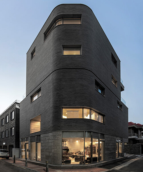 gray brickwork envelops curved 'S gallery' residence near seoul forest