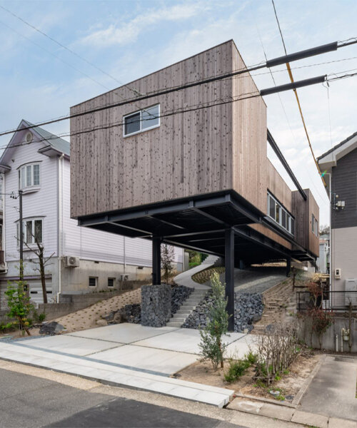 nanometer architecture shelters micro-garden under stilted 'house off the ground' in japan