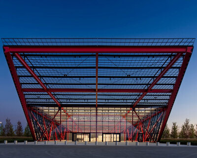 bright red steel frame outlines pritzker military archives center by jahn/ in wisconsin