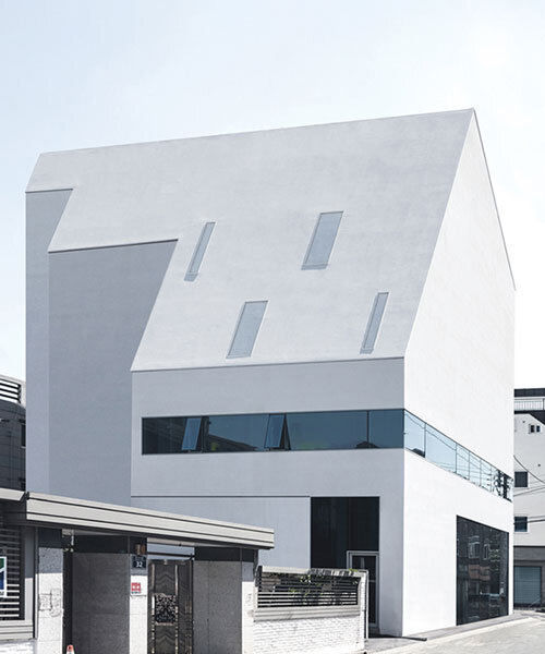 09A's white gabled house shifts perceptions of the familiar in south korean neighborhood