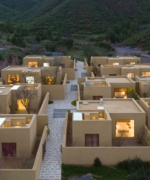 geometric house sculptures emerge from earth for CPLUS' village renewal project in china