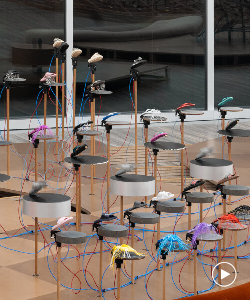 mechanized flip-flops beat their ‘drums’ in meriem bennani’s exhibition at fondazione prada