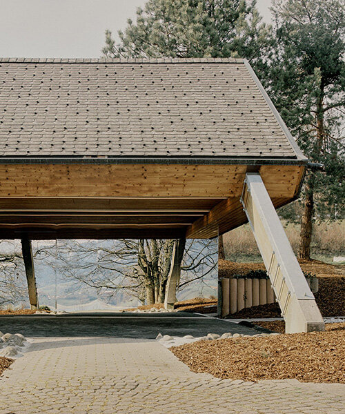 mirrored surfaces extend swiss landscapes in BARAKI’s renovation of public toilets