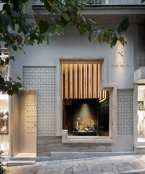 detailed travertine facade fronts athens flagship for greek jeweler nikos koulis