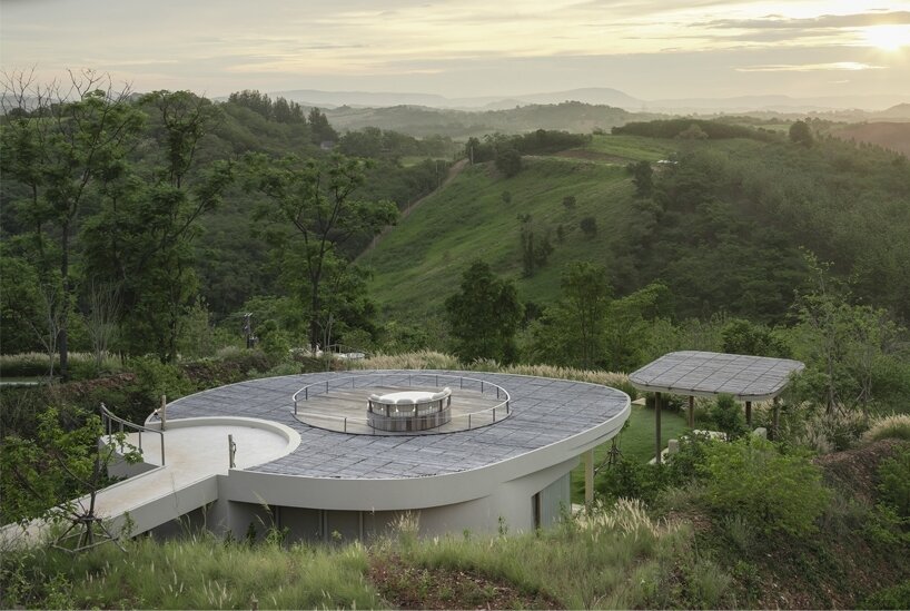 onion expands nature-inspired resort with pool villas atop thai mountains