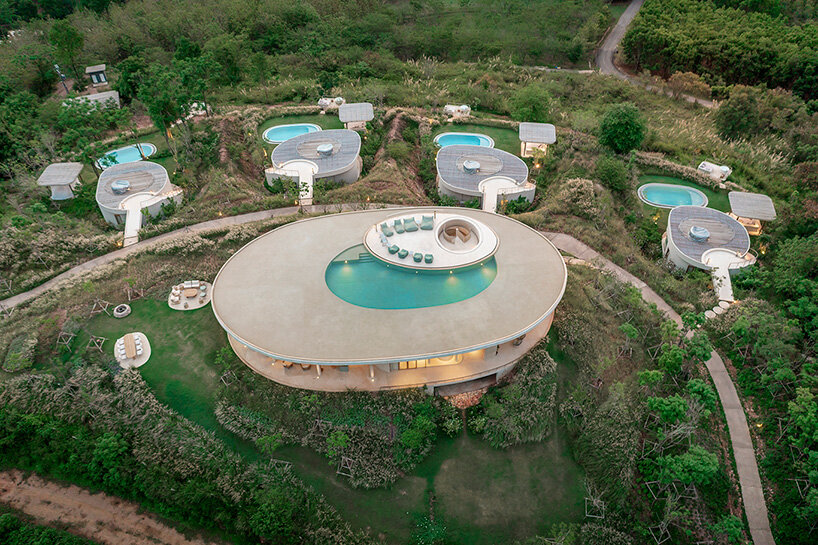 onion expands nature-inspired resort with pool villas atop thai mountains